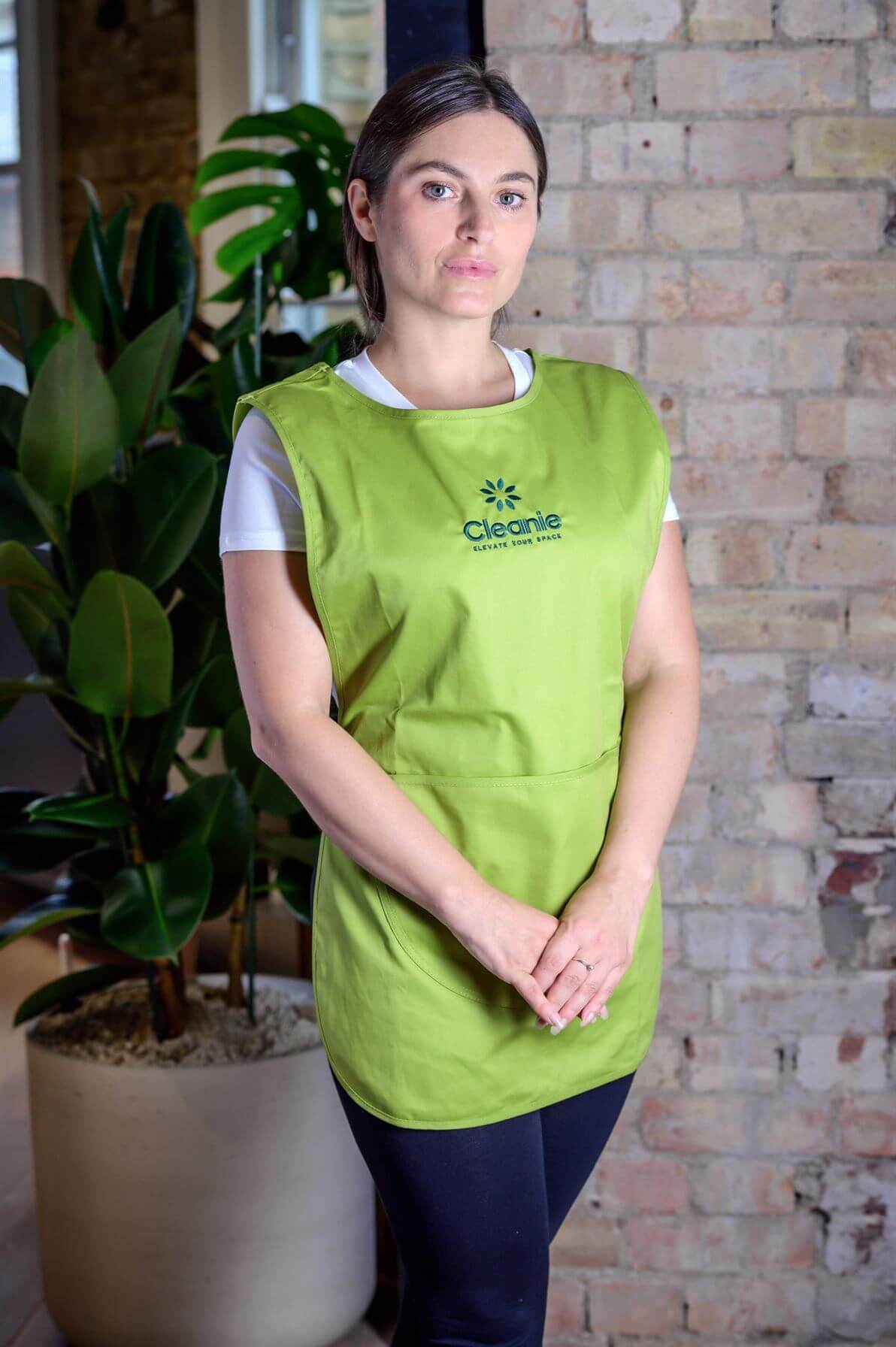 Professional cleaner at work with Cleanie services